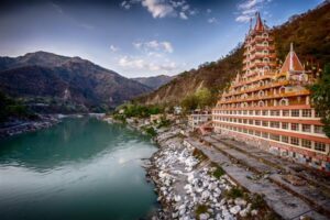 Rishikesh temple side view of canal Custom 1 Mechanic37.in